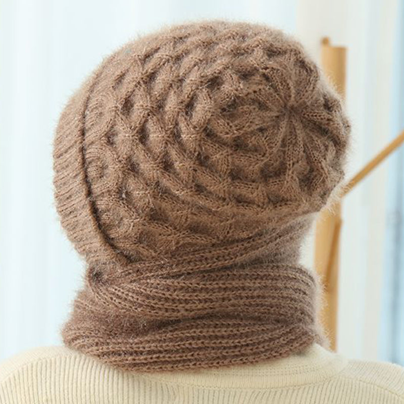 Woman wearing a knit hood with scarf