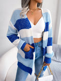 Woman in striped open front cardigan