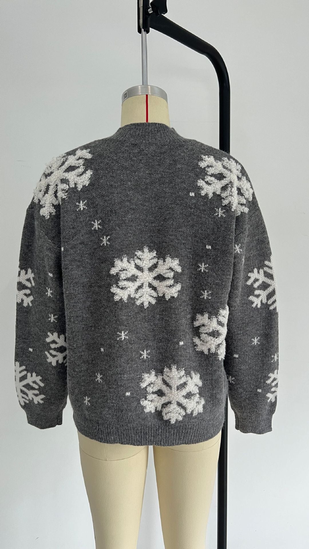 Woman in a fuzzy snowflake sweater