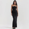 Woman in a strapless satin maxi gown