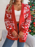 Woman in a reindeer knit cardigan