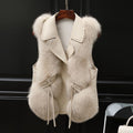 Woman in a short faux fur vest
