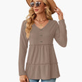 Women’s Sleeveless V-Neck Top with Button Accents and Flowing Hem