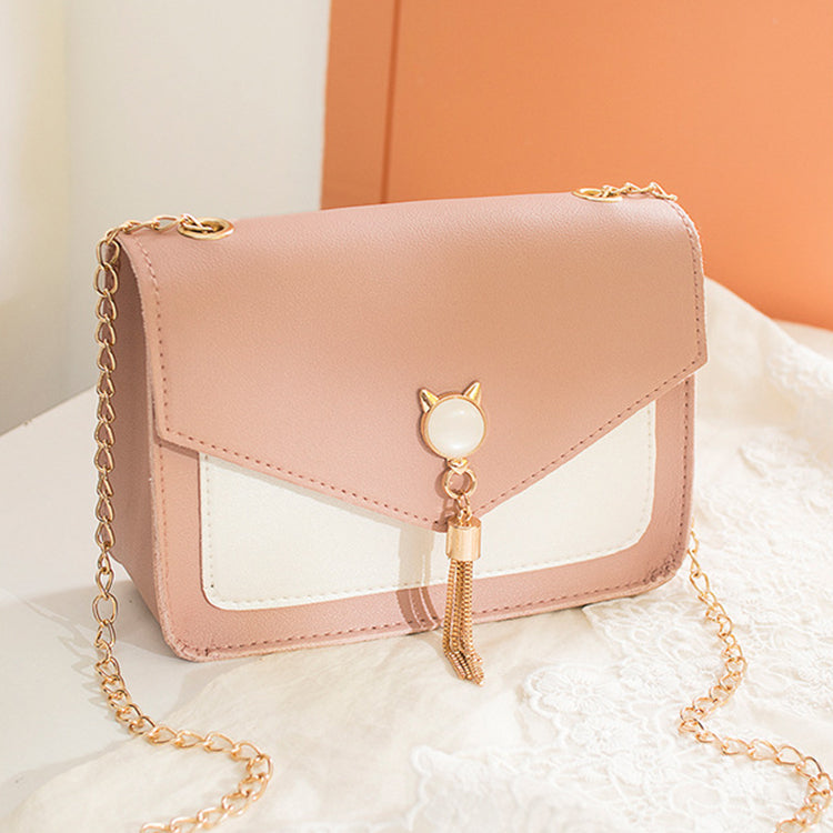 Small square crossbody bag with cat clasp